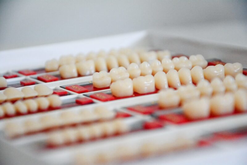 Rows of dental crowns